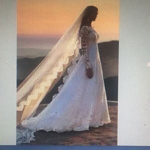 A NEW, UNUSED David’s Bridal Oleg Cassini Dress